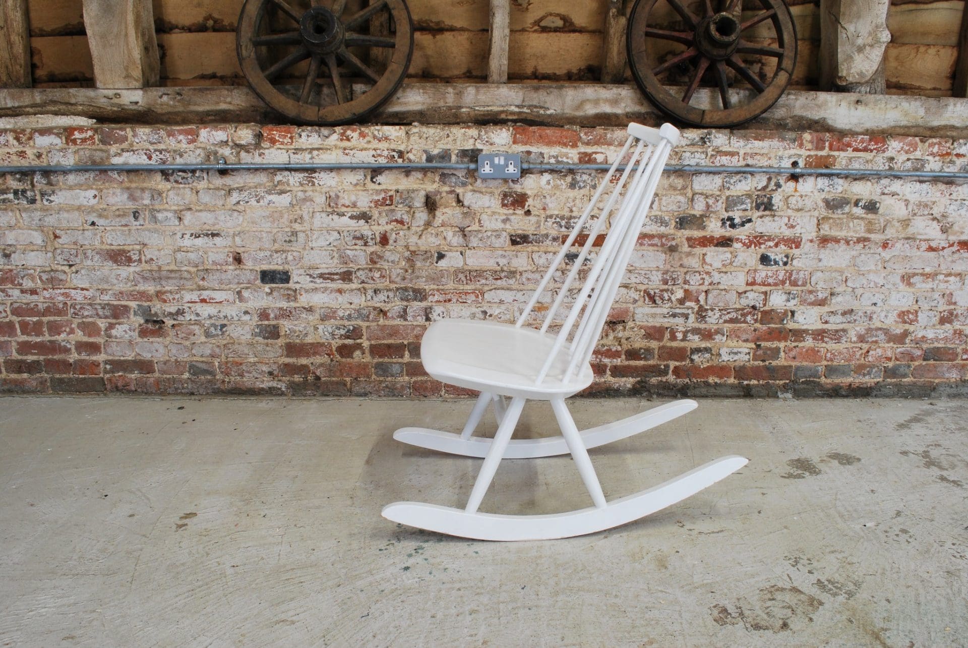 Finnish Mademoiselle Rocking Chair by Ilmari Tapiovaara. ImParlour